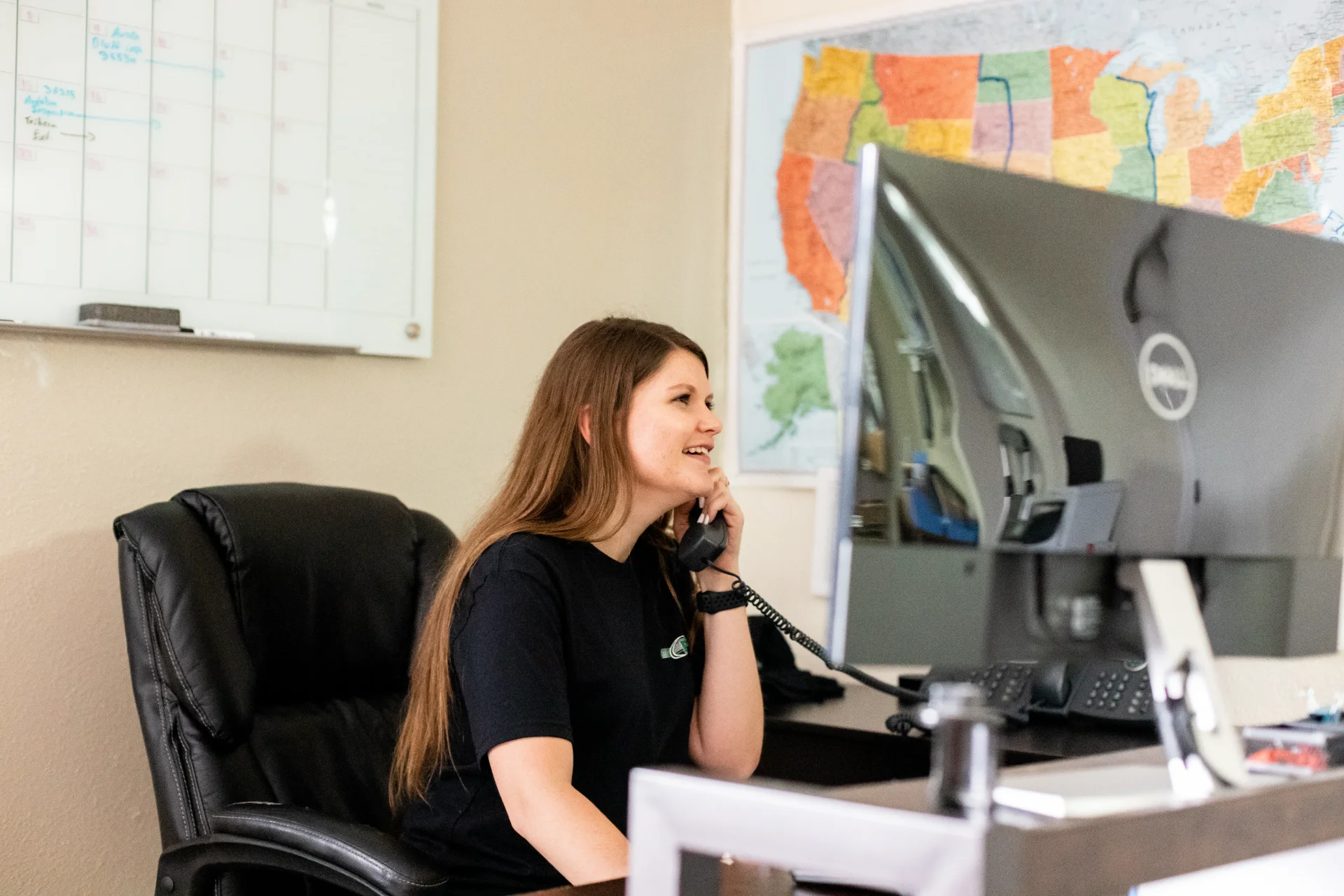 A Pulsar Alarm Systems team member taking a customer call